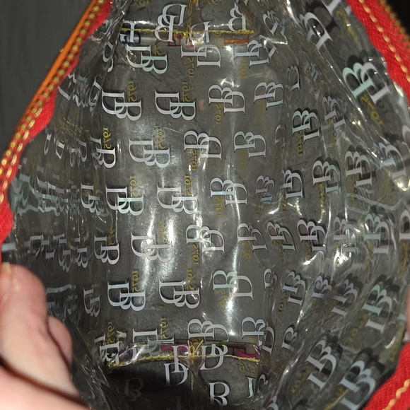 Dooney & Bourke "It On the Go" clear acrylic/PVC cosmetic case with a multicolor - Picture 2 of 5